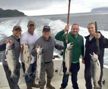 Louis Ullrich fishing with dentists from Alaska