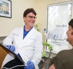 Dr. Alex Touchstone consults with a patient