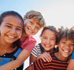 Dentistry from the Heart – a group of happy children