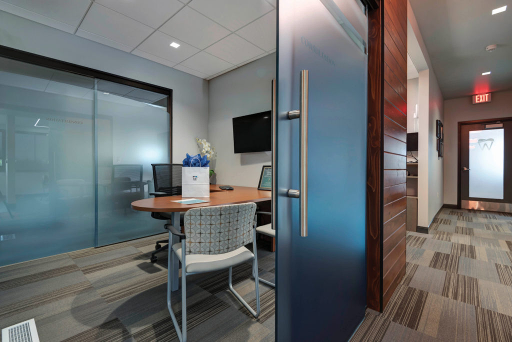 Wilkinson Dental architectural elements and textures carry throughout the space.